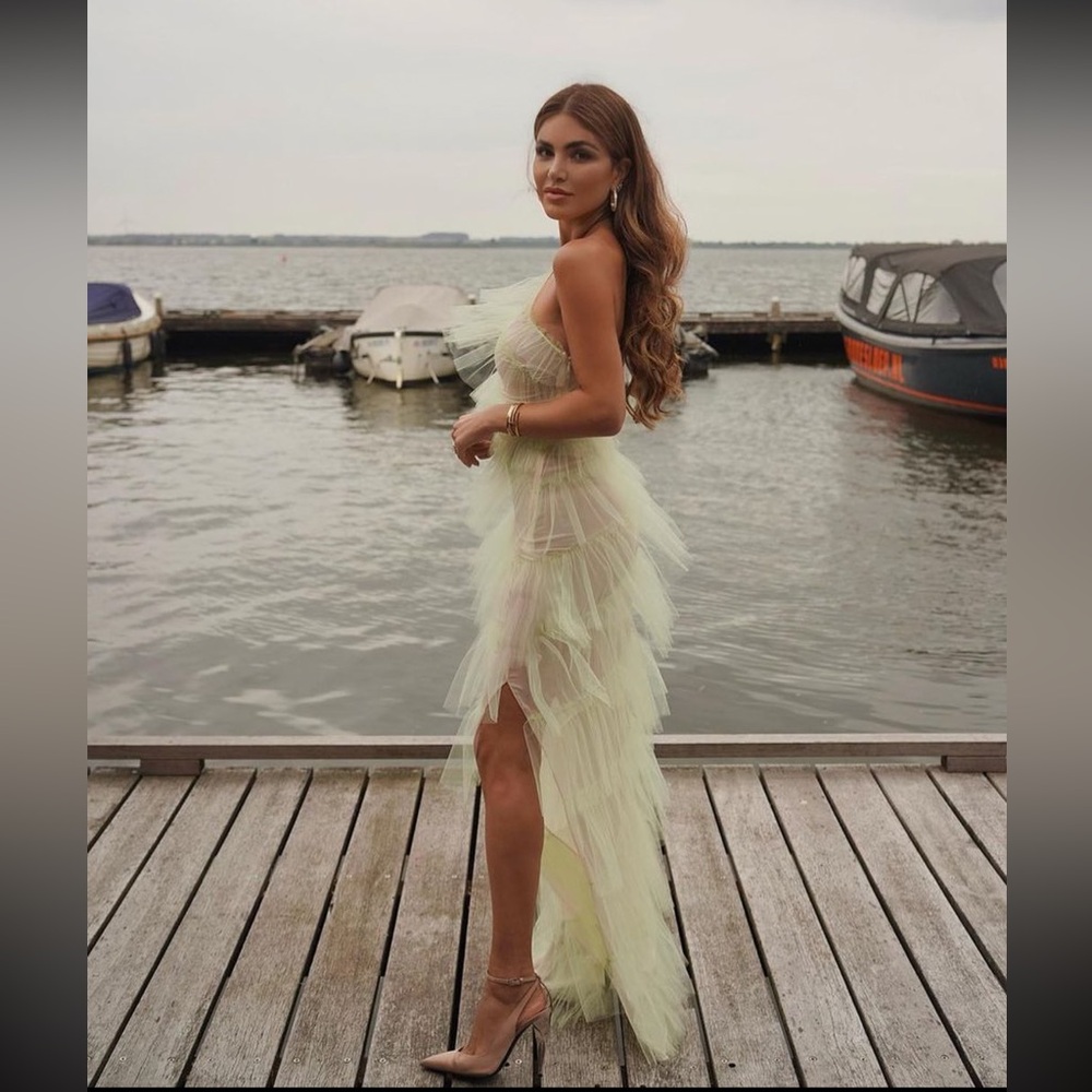 The Bar Henri Tiered Ruffle Gown in color pistachio. Size 00. Never worn.